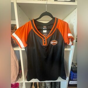 Black and orange woman’s HD T shirt. Sz lg.